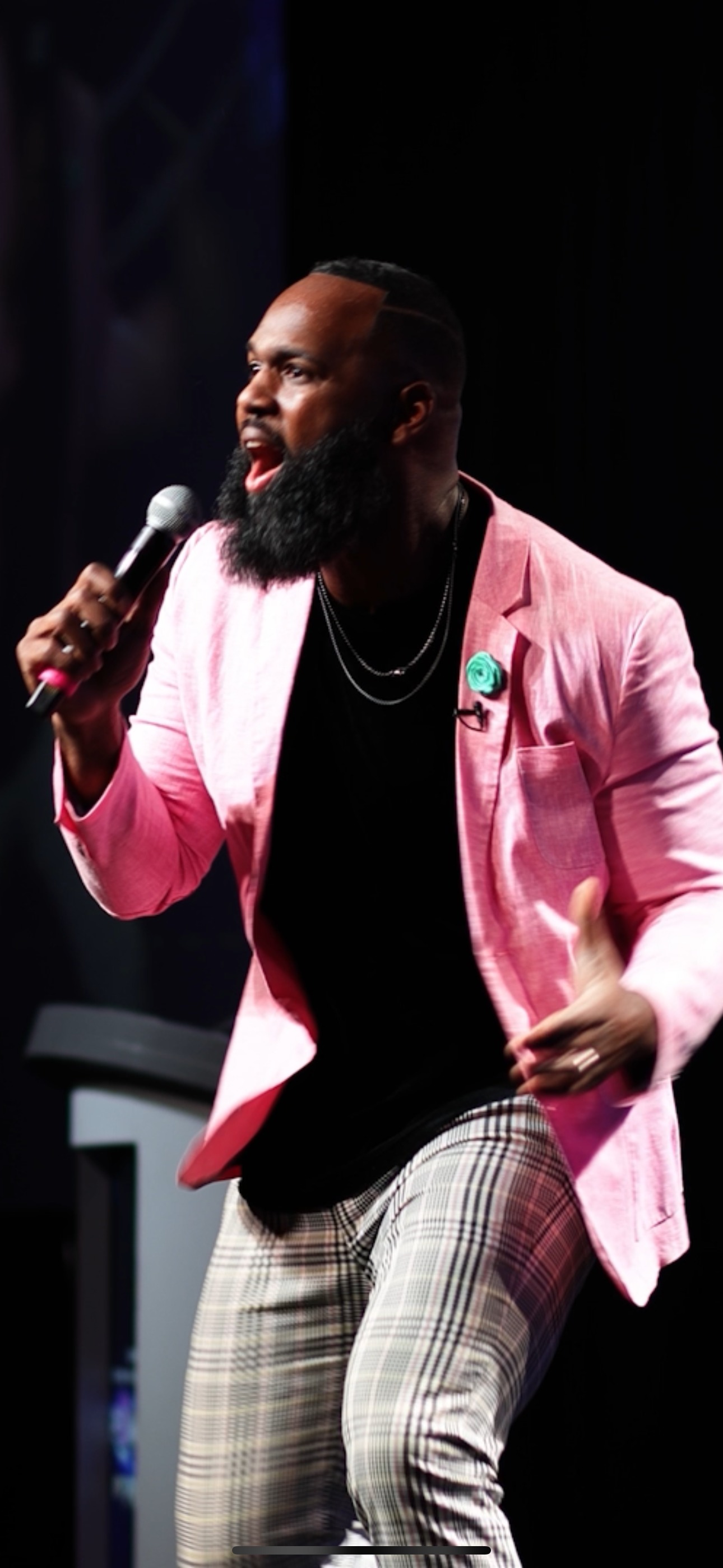 Andre Fluellen speaking on stage